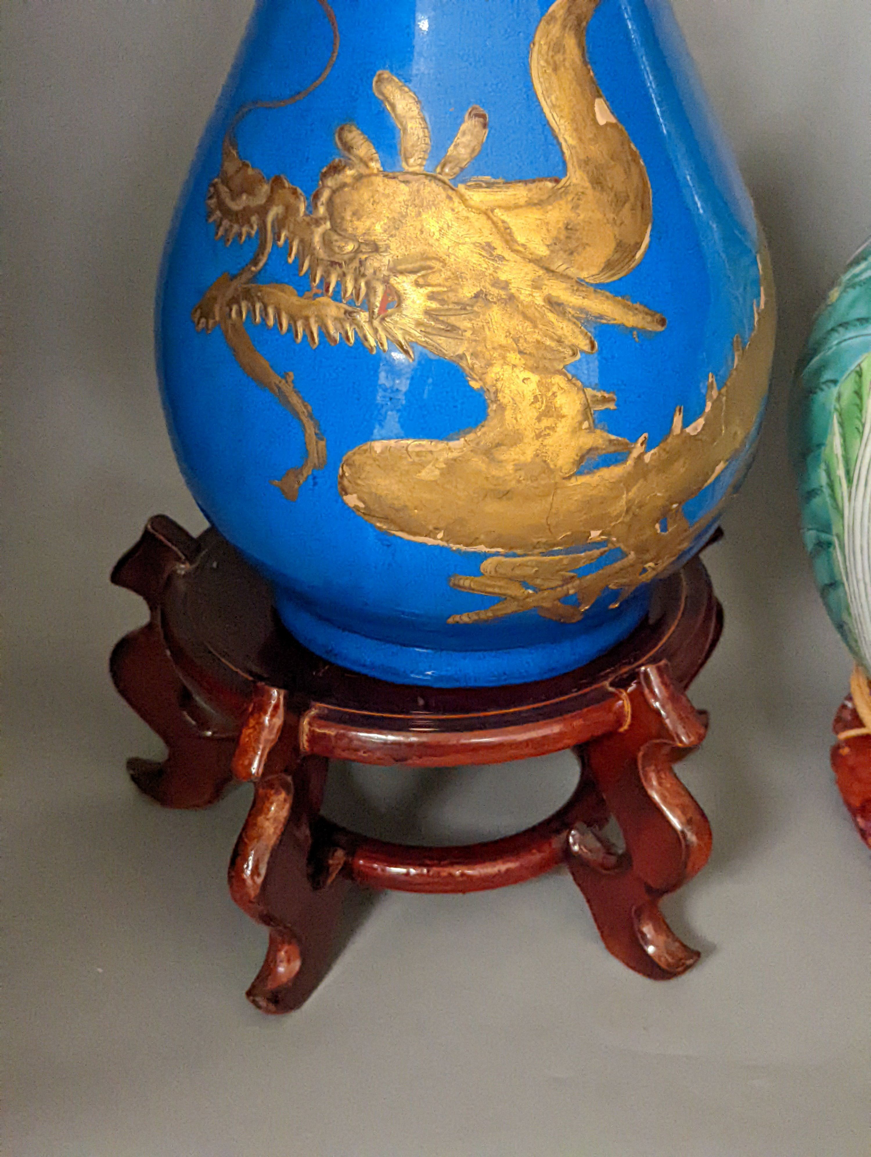 A Japanese gilt lacquered and turquoise glazed ’dragon’ vase on stand, and a Chinese cabbage patterned table lamp, Dragon vase and stand 65 cms high.